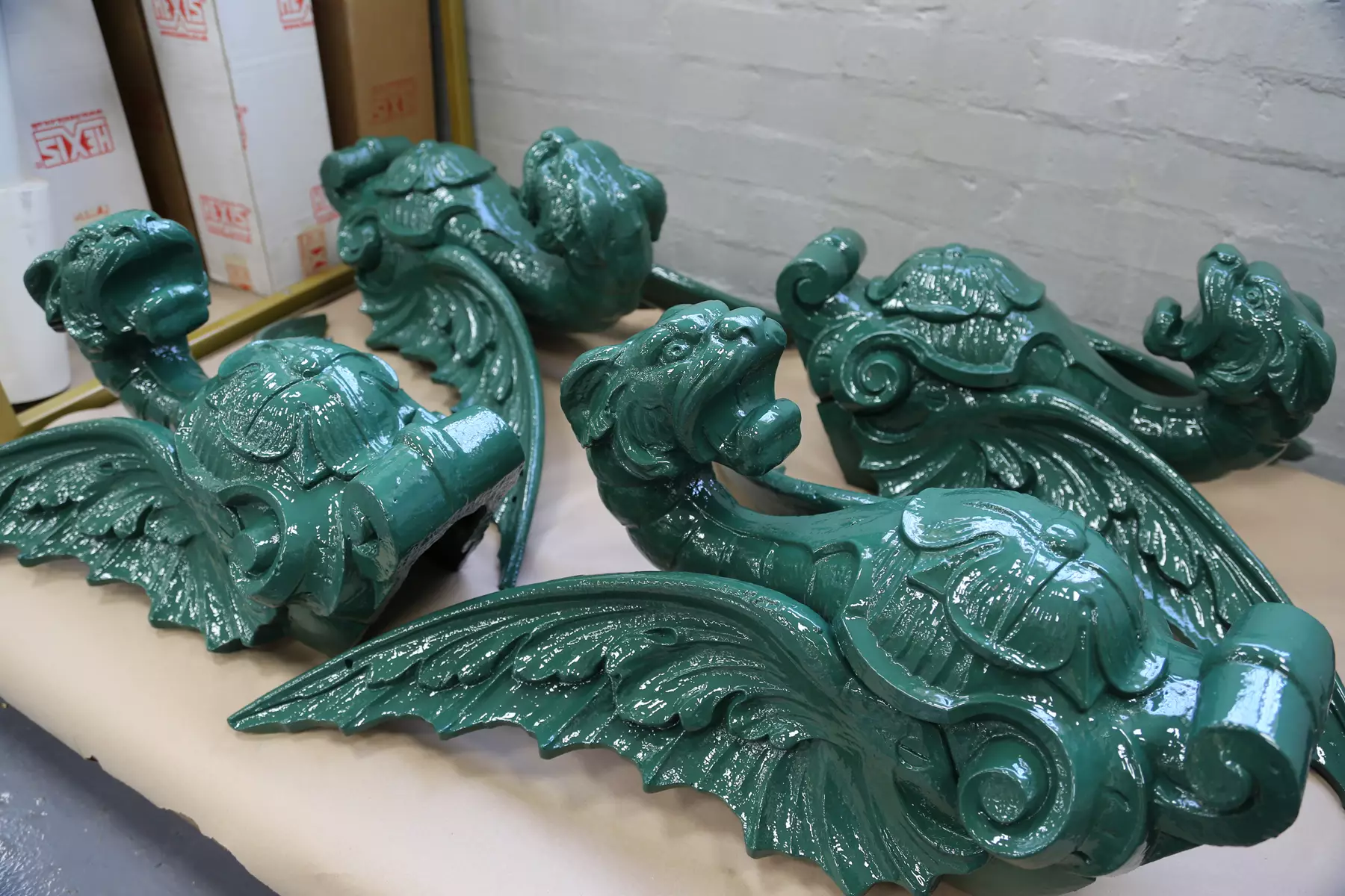 Dragons zinc coated and painted green